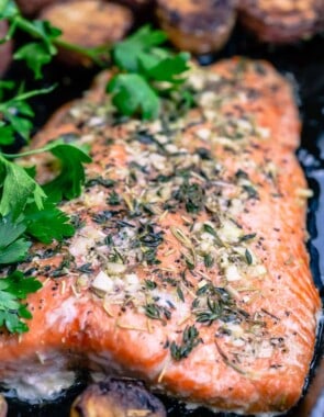 slow roasted salmon garnished with parsley