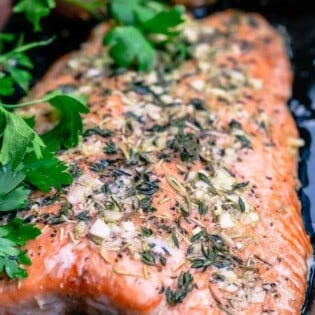 slow roasted salmon garnished with parsley