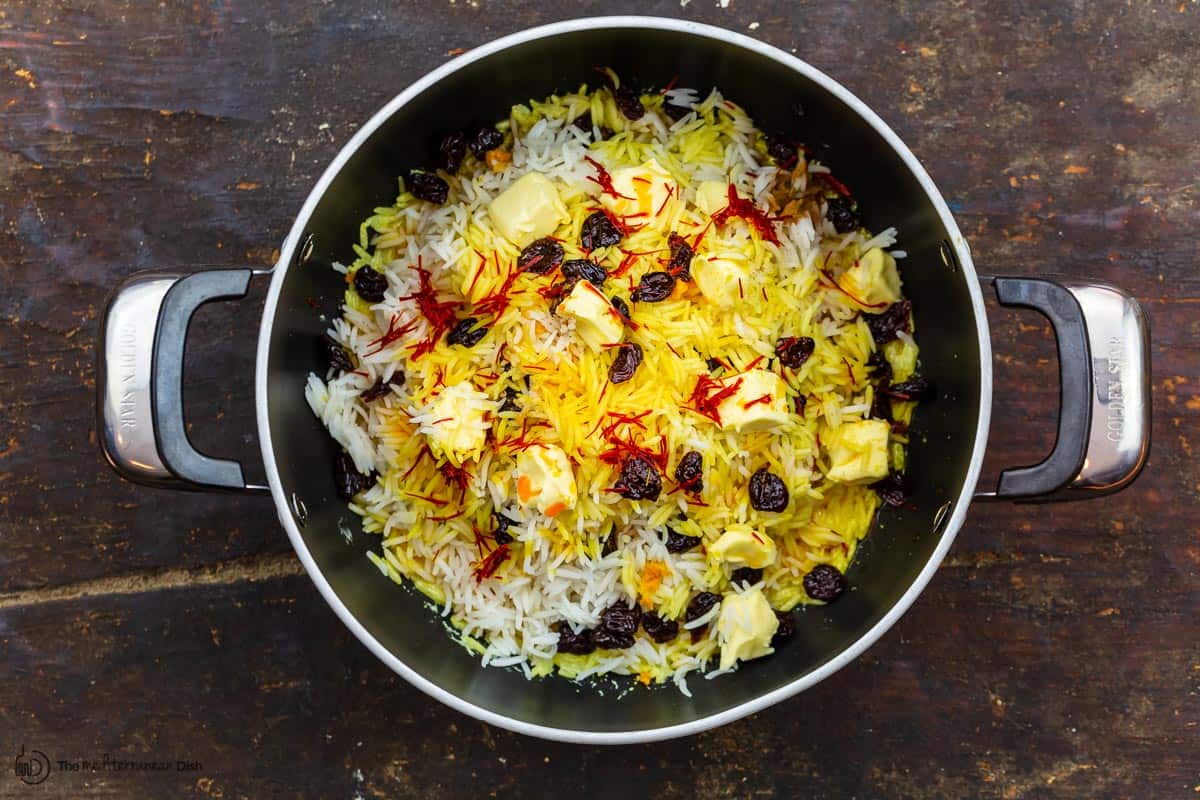 rice layered with orange zest, cinnamon and dried cherries and butter.  ready to cook 