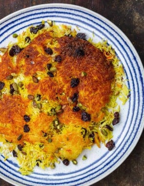 Persian rice tahdig, garnished with dried cherries and pistachios