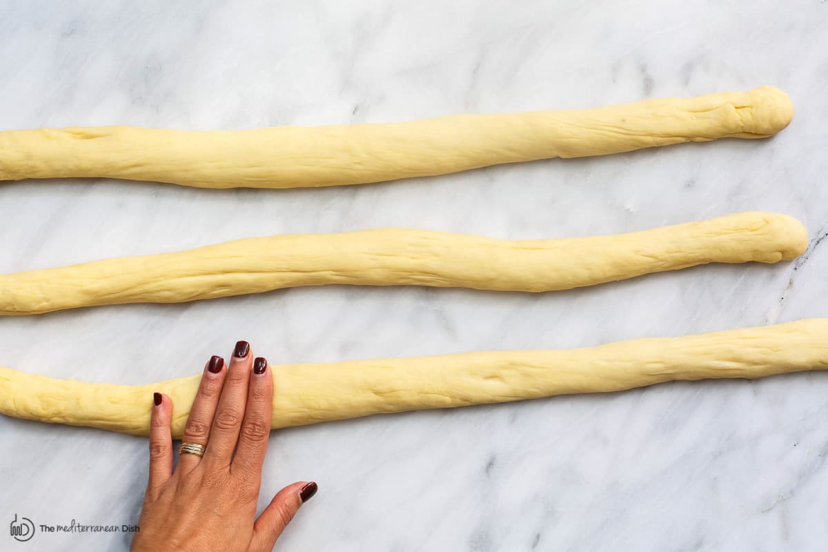 Rolling braids for challah bread