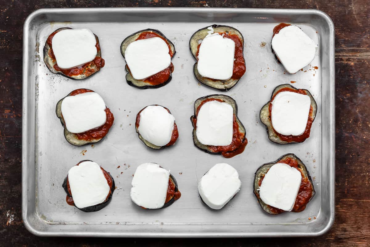 eggplant slices topped with marinara sauce and mozzarella cheese.