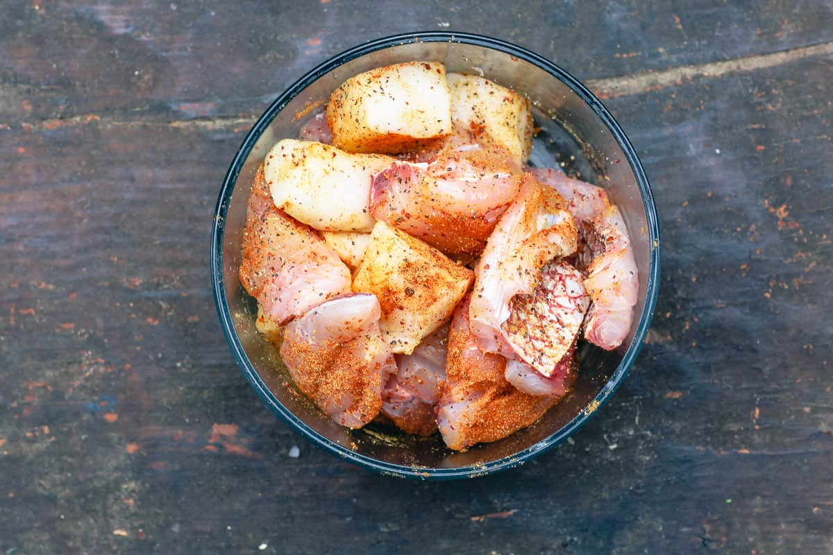 Chunks of fish cut up into pieces and seasoned with spice mixture 