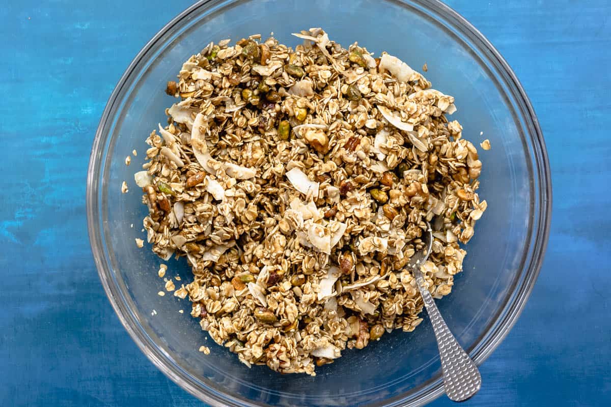 wet and dry ingredients for granola mixed 