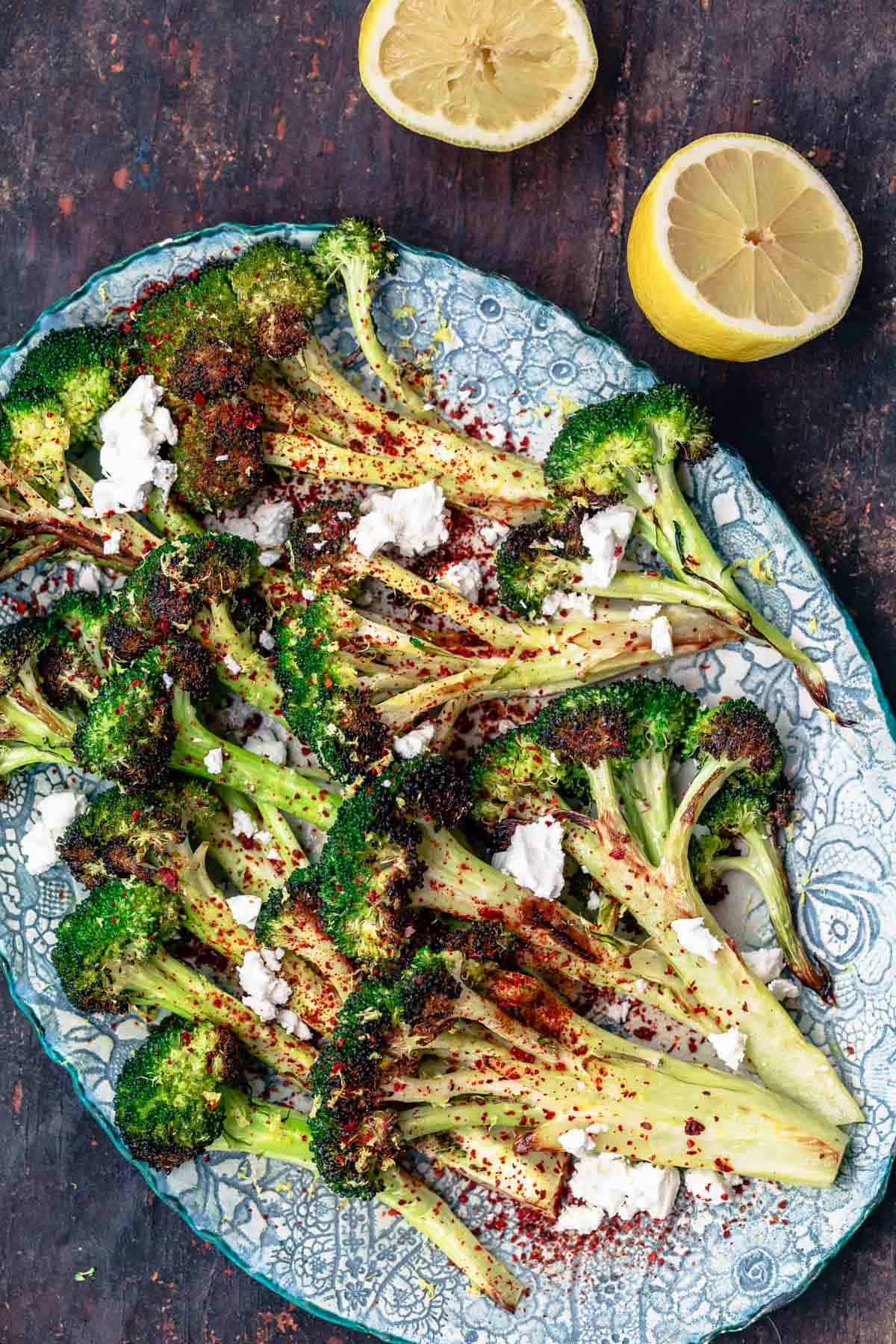 roasted broccoli with feta, red pepper flakes and a side of lemon wedges