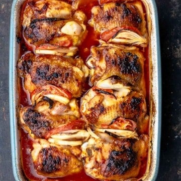 Baked chicken thighs in a large baking dish