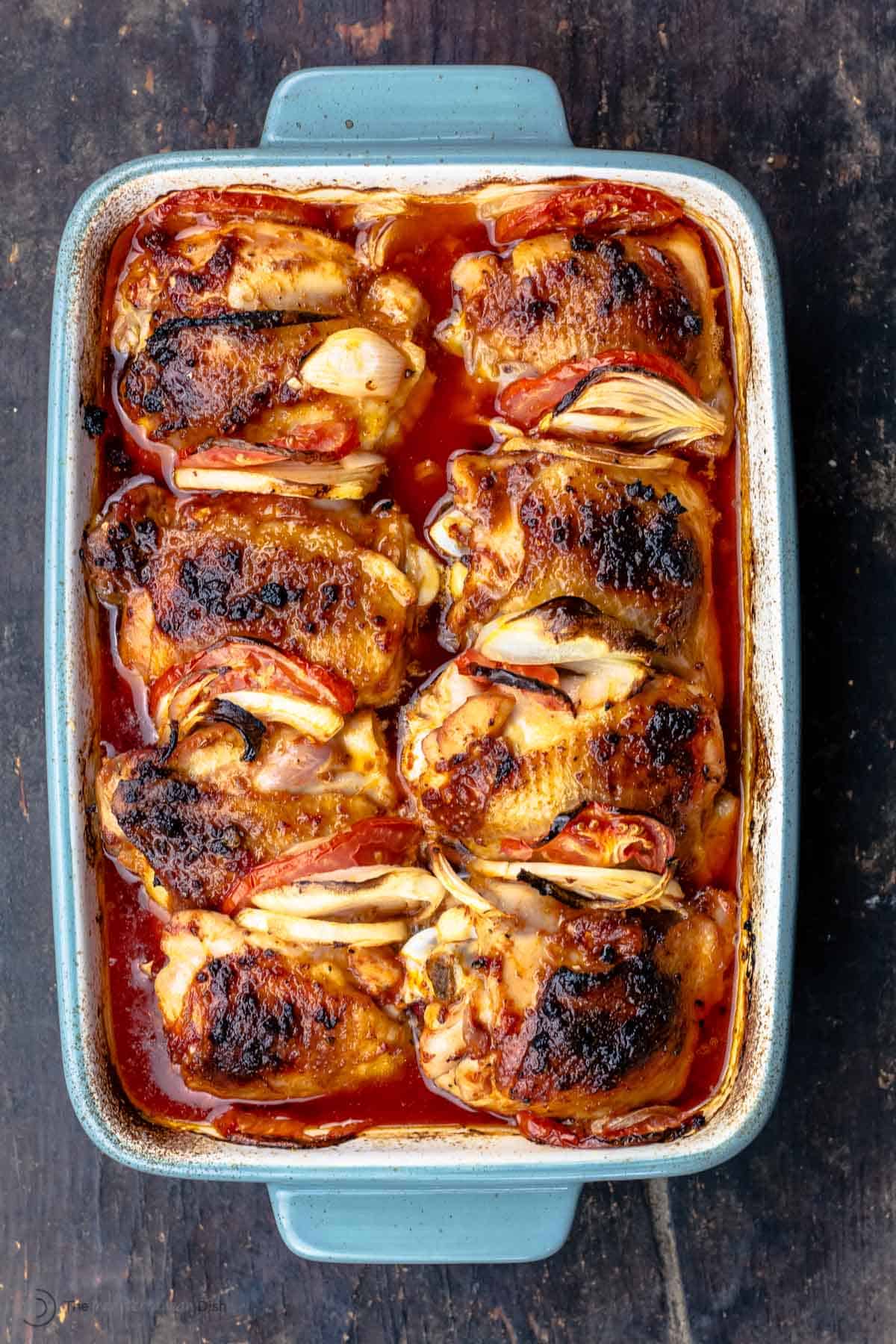 Baked chicken thighs in a large baking dish