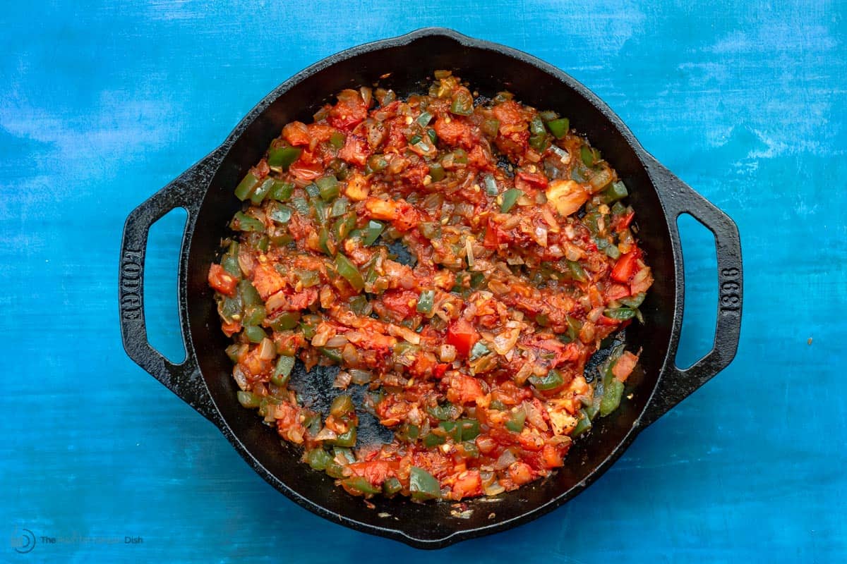 SautÃ©ed vegetables and tomatoes in skillet