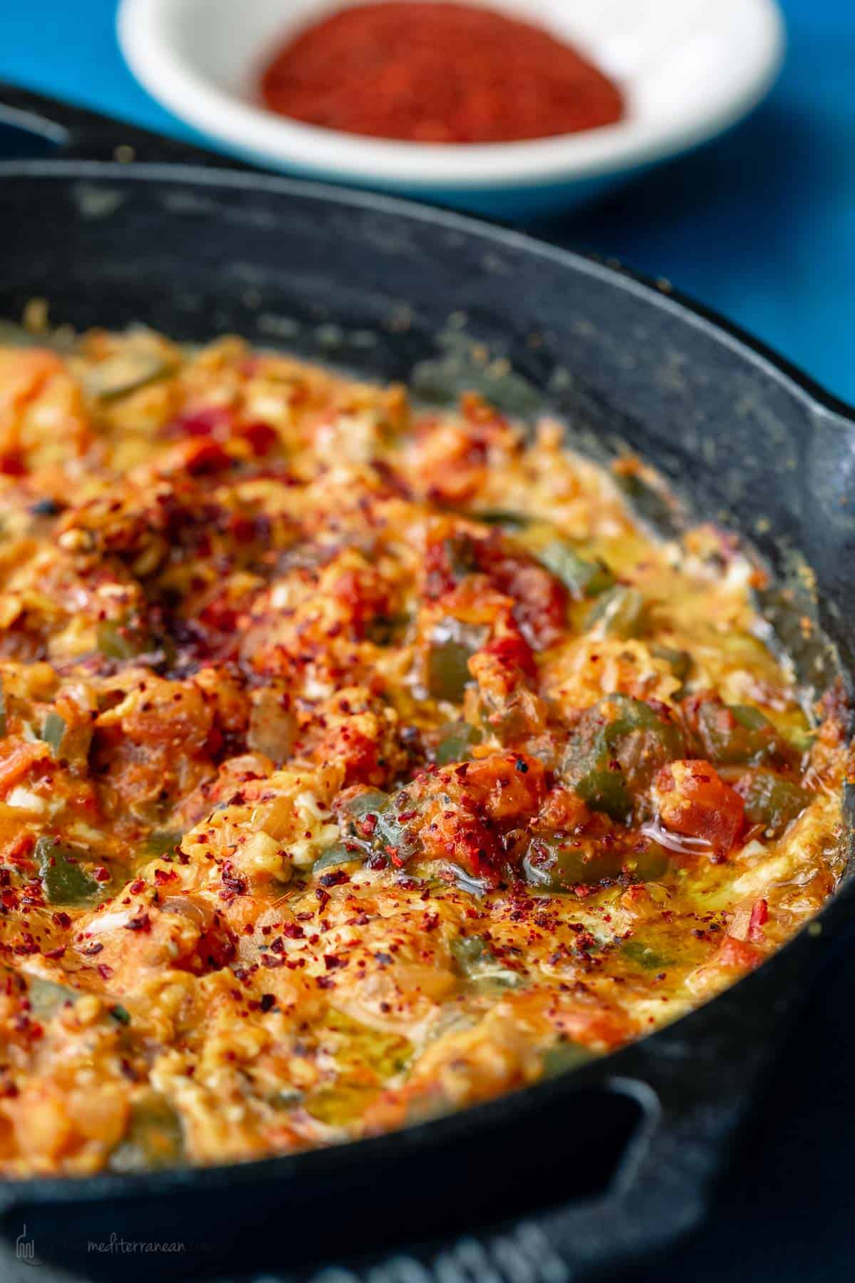 Turkish menemen recipe served in cast iron skillet