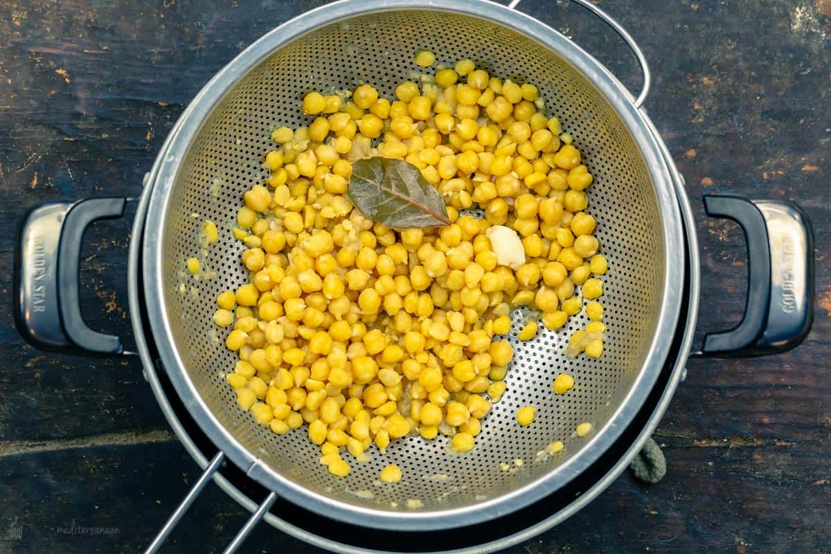 chickpeas draining in a collander