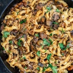 A skillet with mushroom pasta