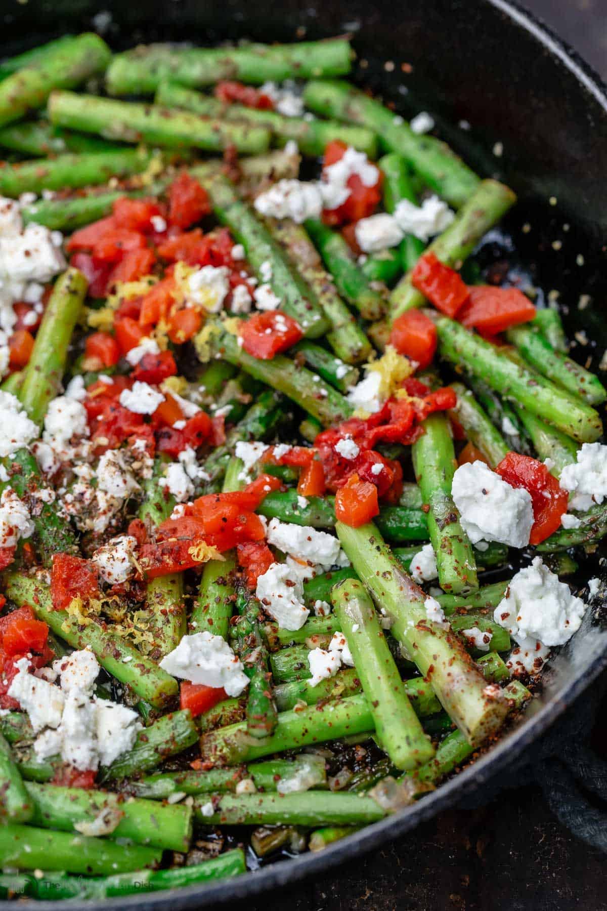 lemon garlic asparagus topped with feta and roasted red peppers