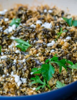 Spanakorizo topped with spinach and feta