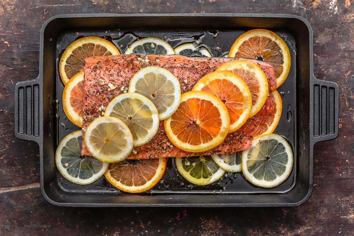 Raw fillet of salmon prepared in cast iron skillet