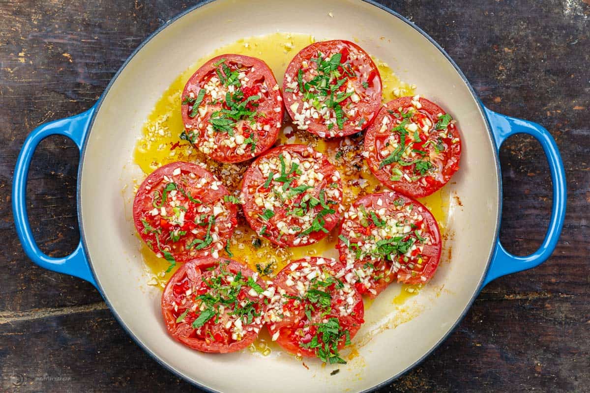Tomatoes fried in frying pan