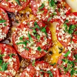 Fried tomatoes topped with mint and minced garlic