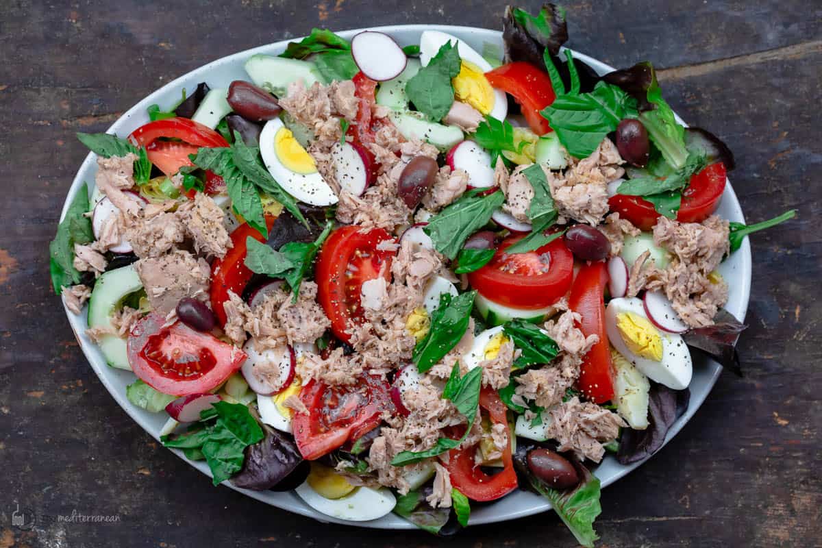 A Platter on a Picnic Table Holding a Fresh Nicoise Tuna Salad