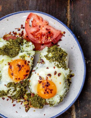 Eggs with pesto on a plate