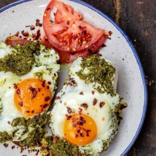 Eggs with pesto on a plate