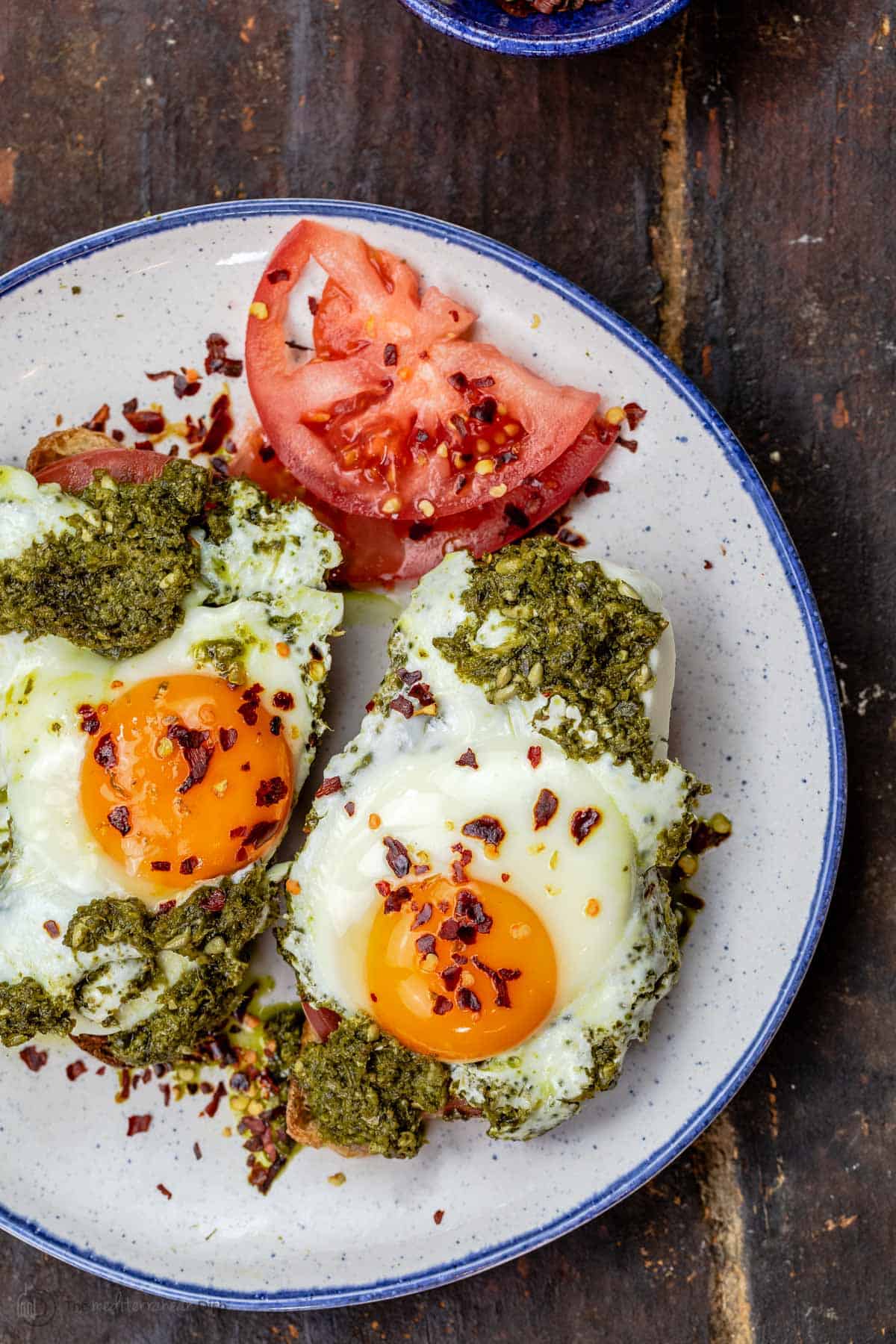 Eggs with pesto on a plate
