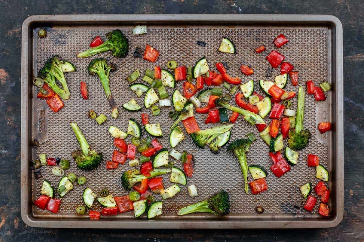 Roasted Bell Peppers, Zucchini, Green Onion and Broccoli on a Rimmed Baking Sheet