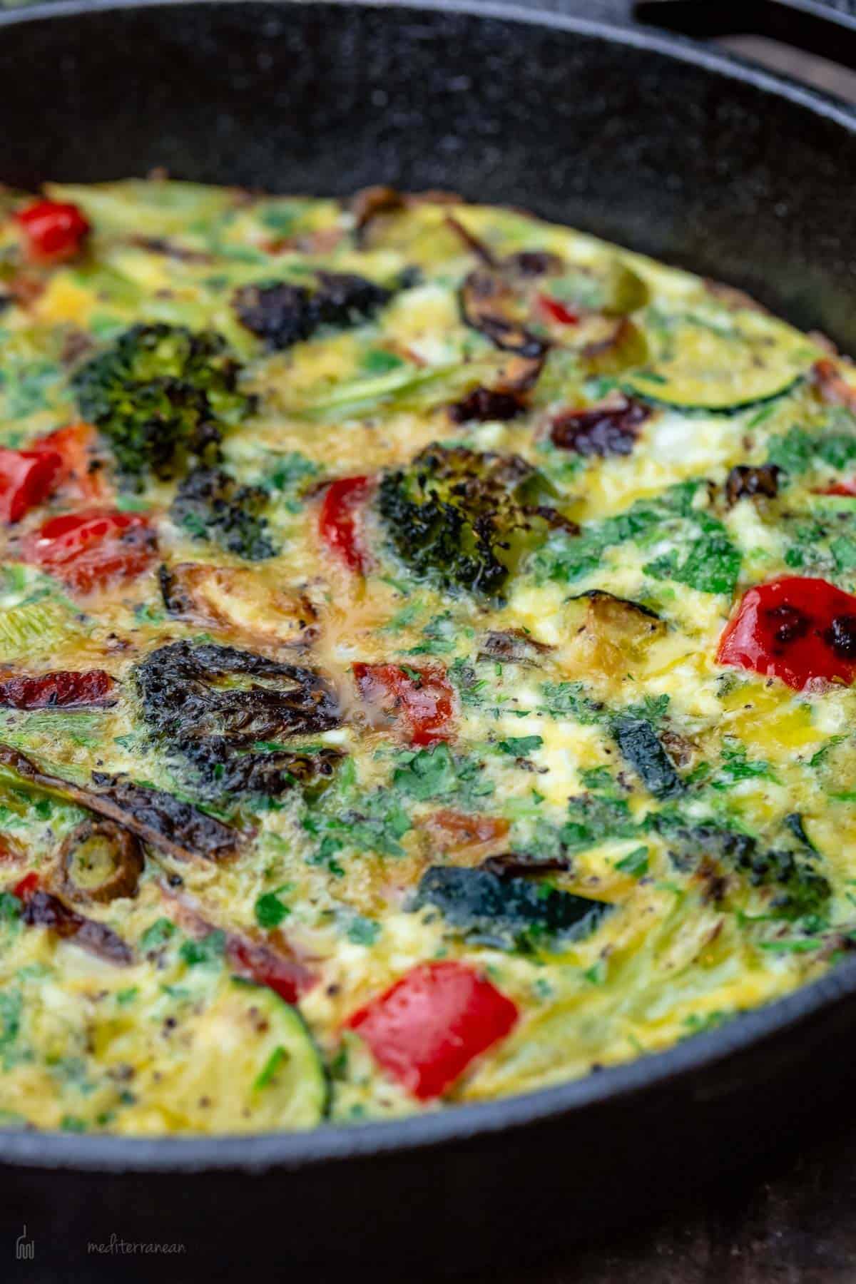 A Close-Up Shot of a Vegetable Frittata in a Cast-Iron Pan