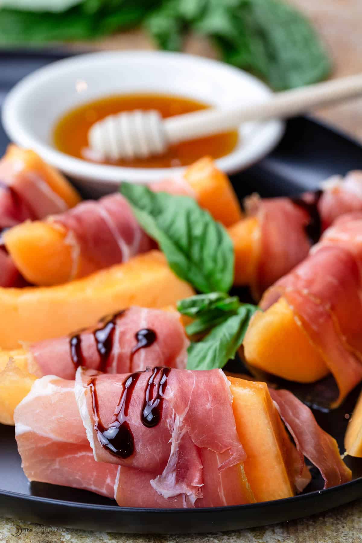 Prosciutto and melon served on a plate