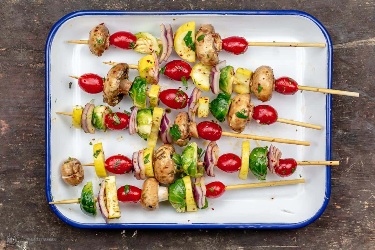 Marinated veggies on skewers ready to be grilled