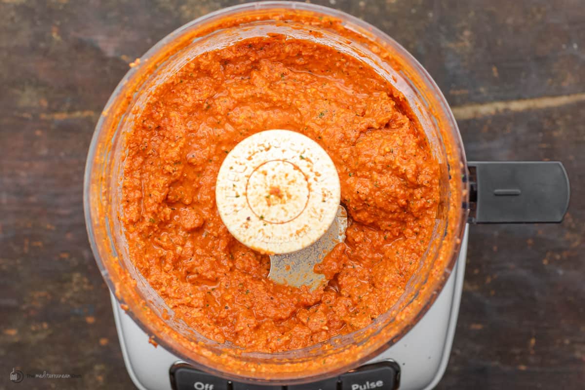 All of the ingredients of romesco sauce in a food processor