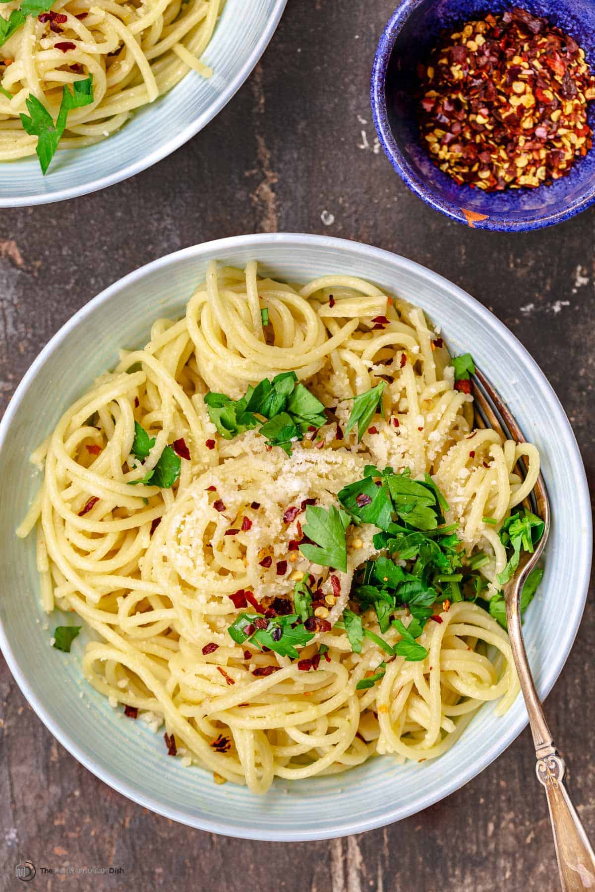 Aerial view of a big bowl of spaghetti aglio e olio