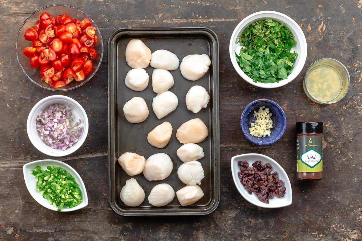 Ingredients needed to make Mediterranean-style salsa and grilled scallops