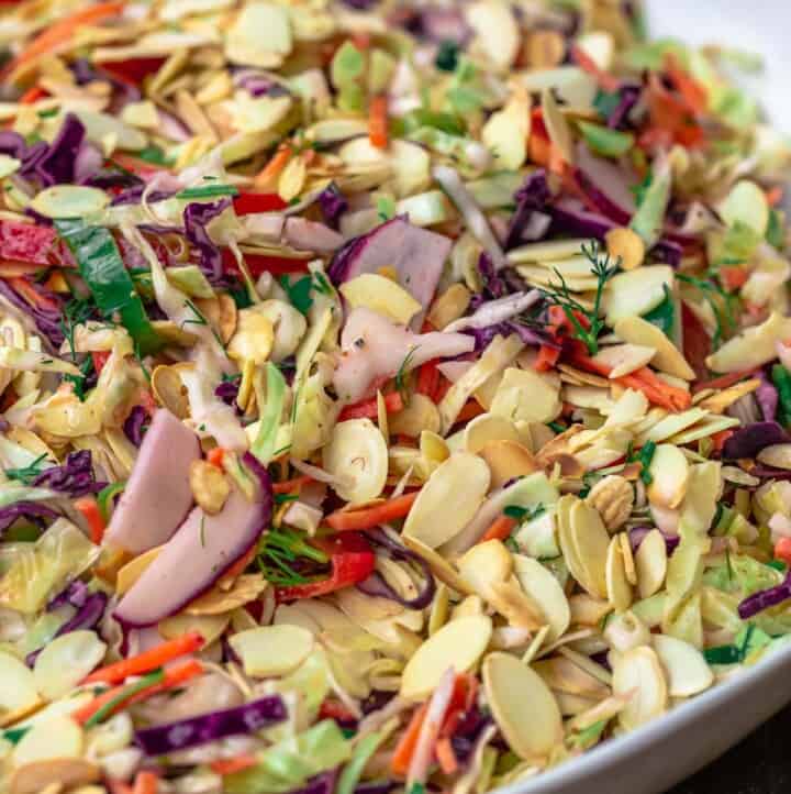 A close-up of a bowl of coleslaw without mayo