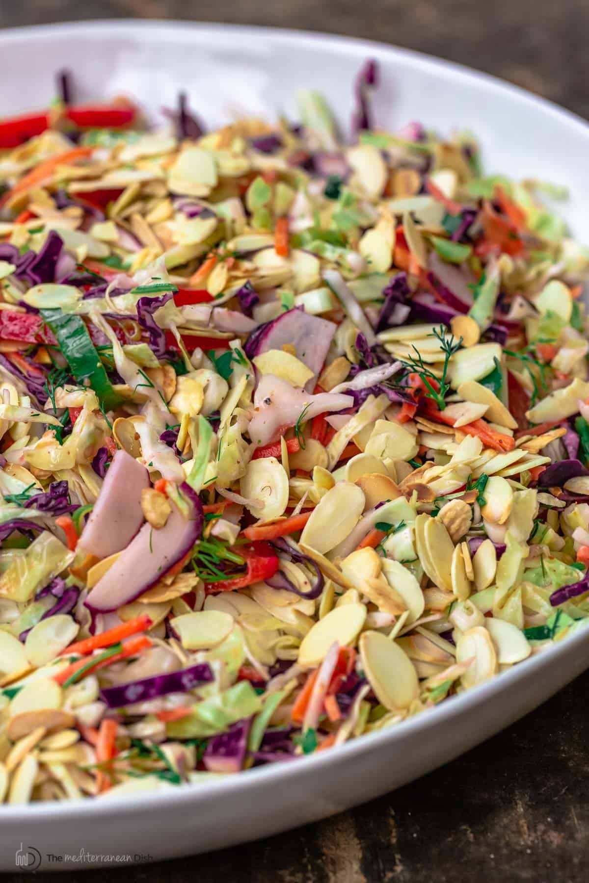 A close-up of a bowl of coleslaw without mayo