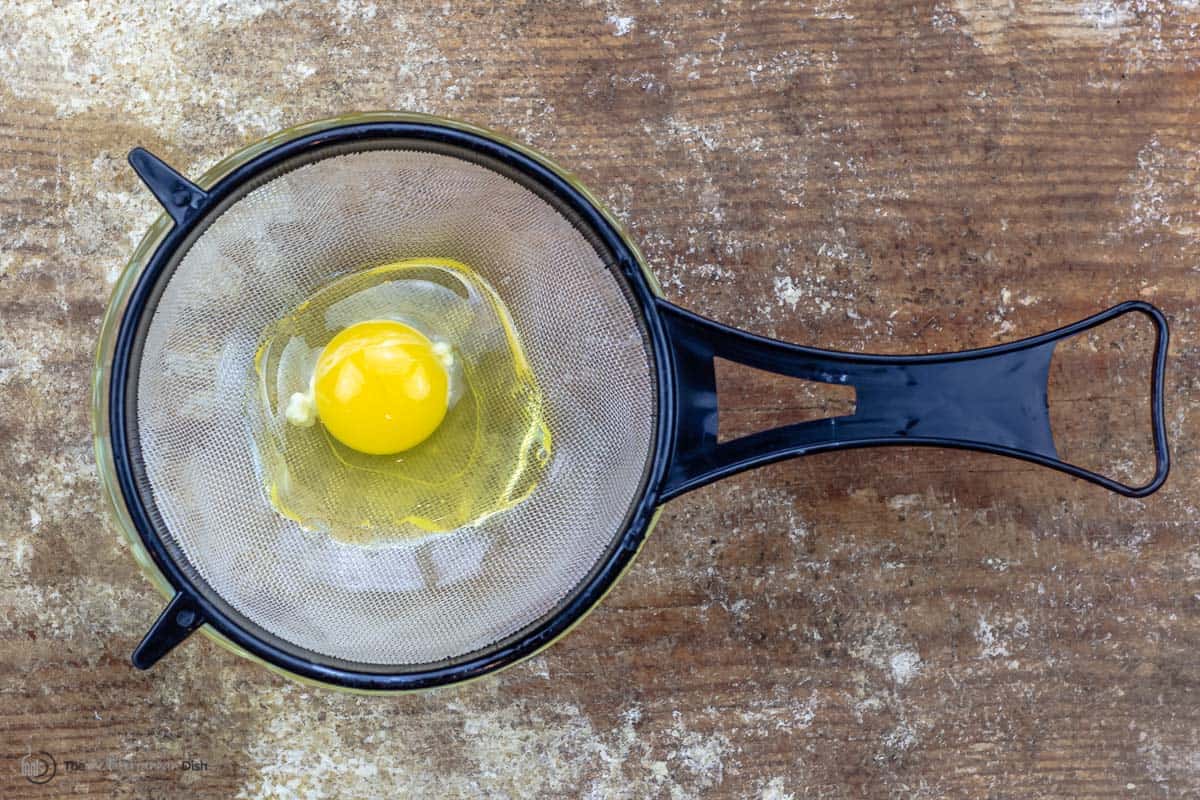 A cracked in a mesh sieve