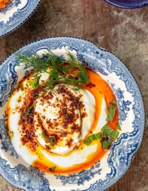 Cilbir Turkish Eggs in a blue dish