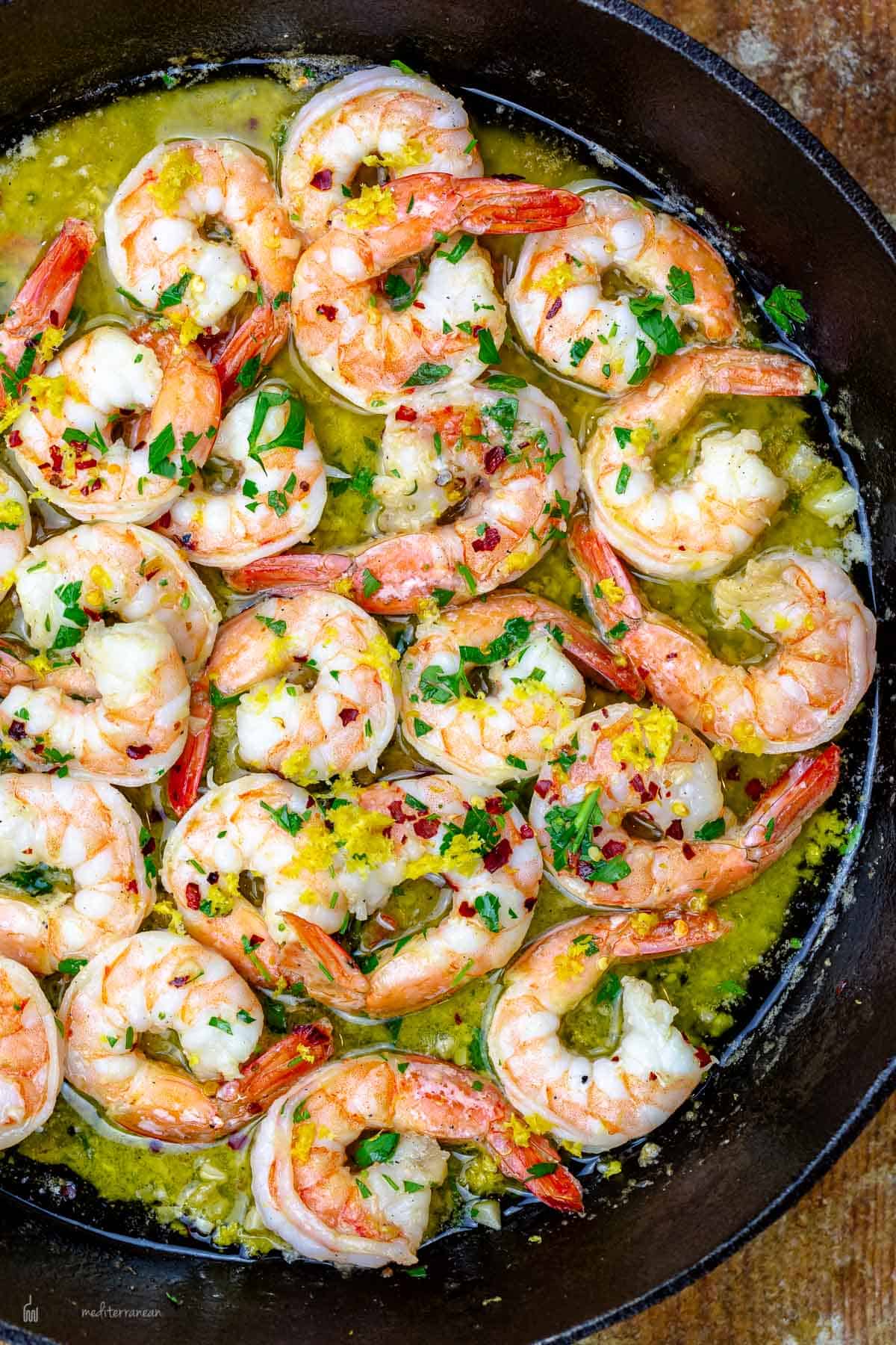 Make perfectly buttery grilled shrimp with this cast iron shrimp pan