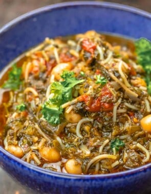 A blue bowl of Mediterranean spinach stew