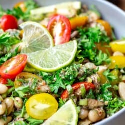 Mediterranean white bean and sardine salad in a white bowl
