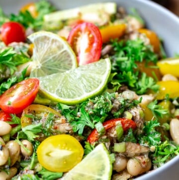 Mediterranean white bean and sardine salad in a white bowl