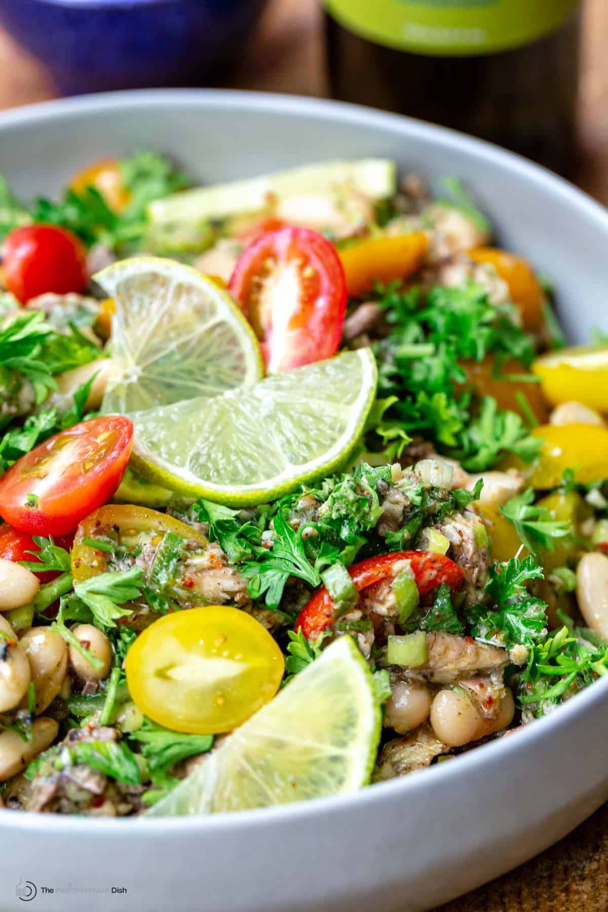 Mediterranean white bean and sardine salad in a white bowl