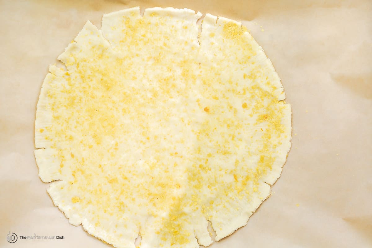 Pie dough layered with nutritional yeast