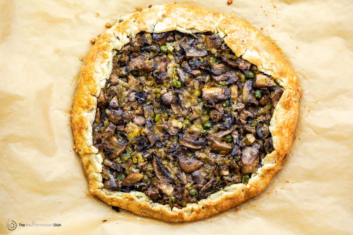 Overhead view of a savory galette with mushrooms