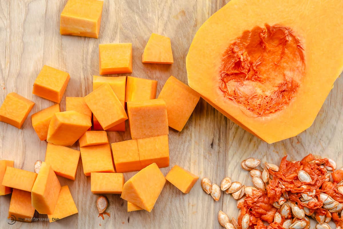 Overhead view of butternut squash cut into chunks