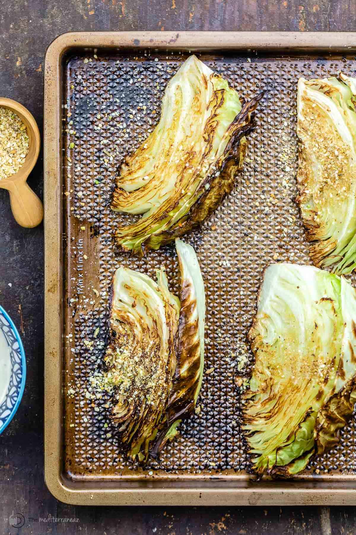 Overhead view of roasted cabbage wedges