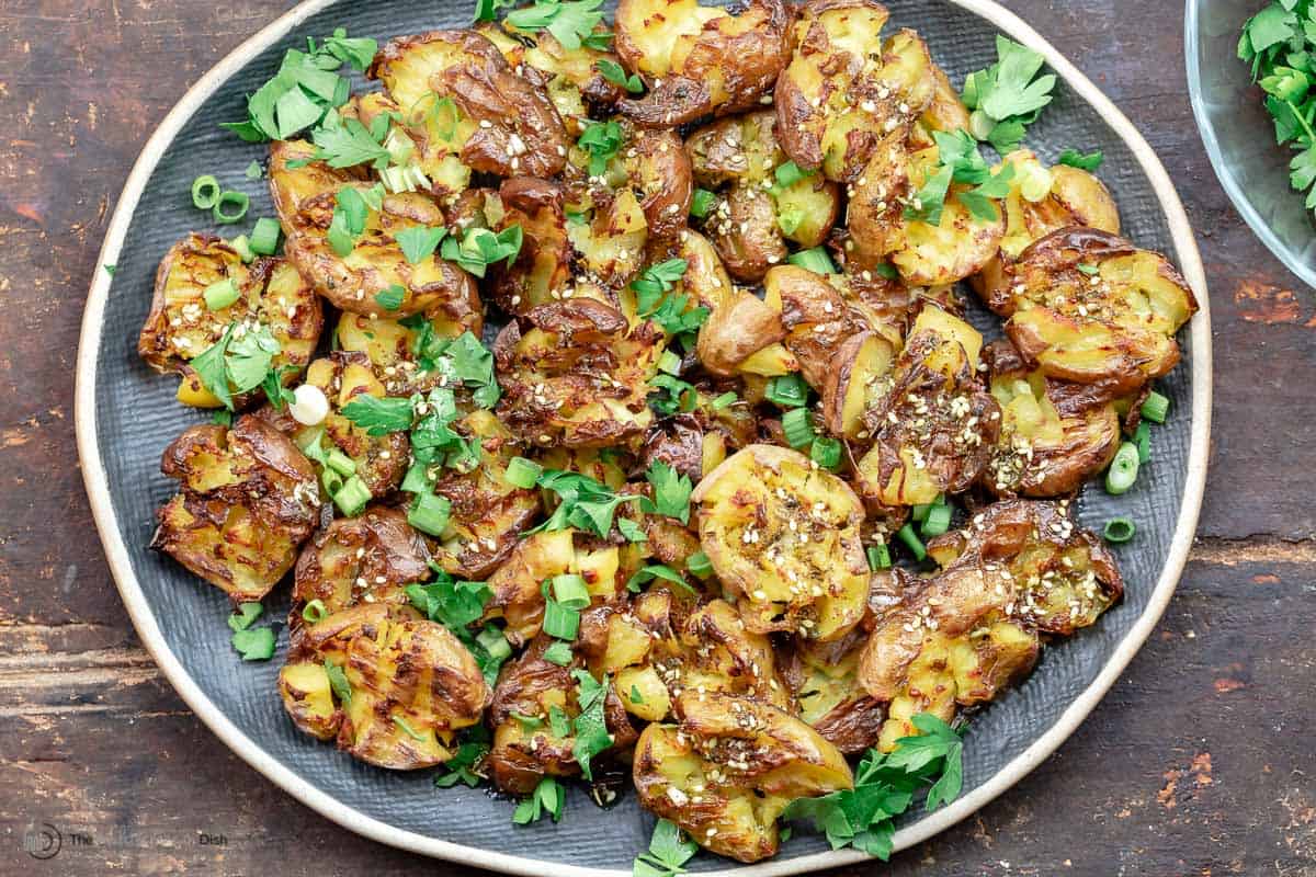 Crisp Smashed Potatoes With Fried Onions and Parsley Recipe - NYT