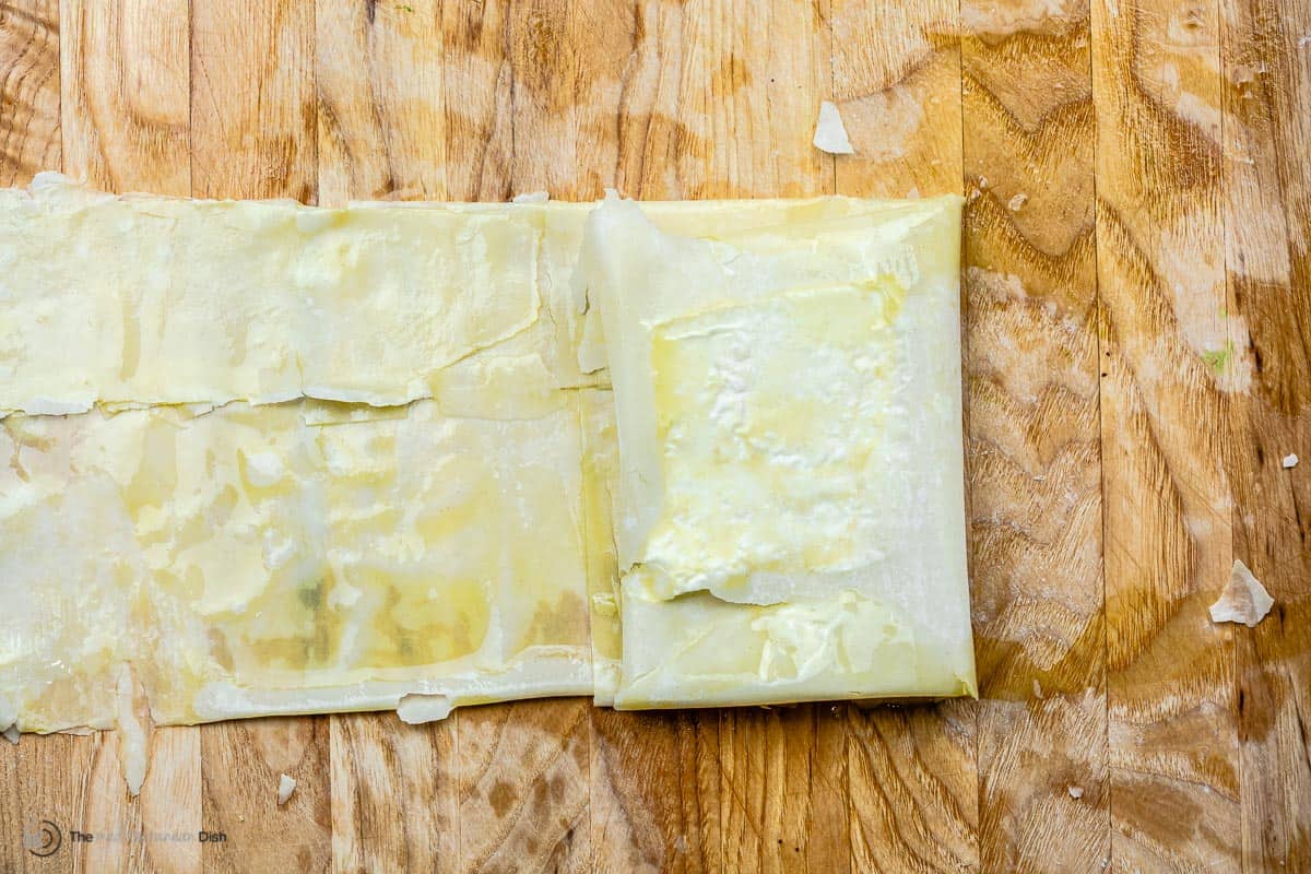 block of feta almost completely wrapped in filo pastry