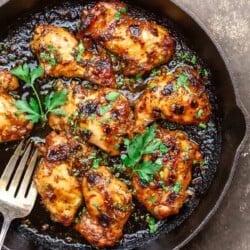 baked balsamic chicken in a cast iron skillet