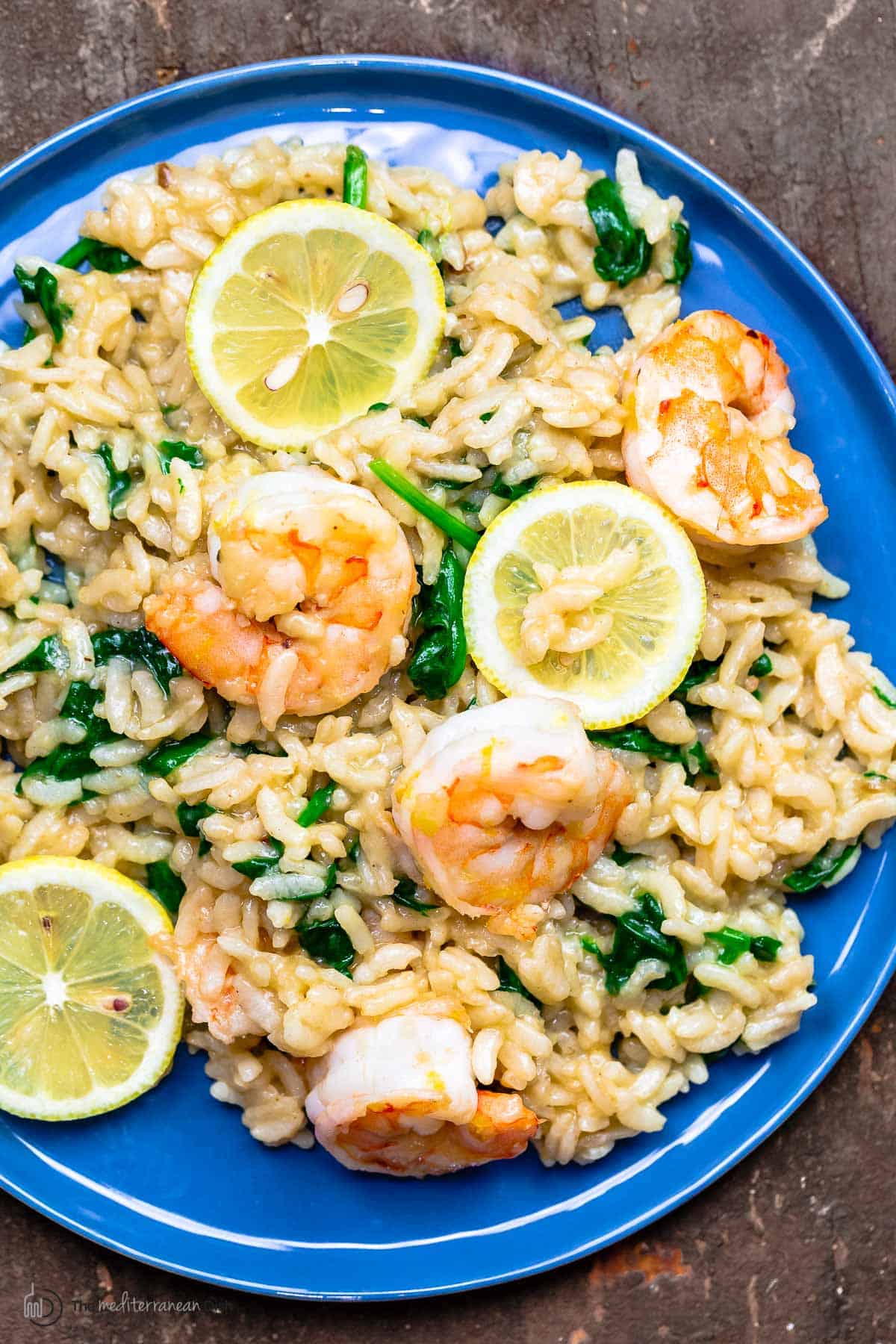 lemony risotto with shrimp on a blue plate