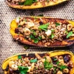 roasted delicata squash stuffed with farro, nuts, and dried fruit