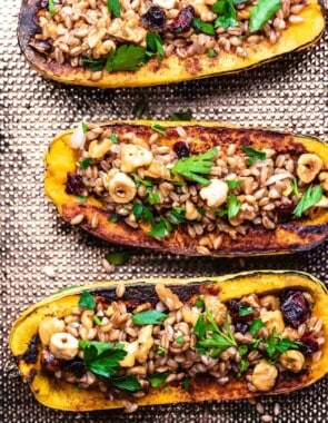 roasted delicata squash stuffed with farro, nuts, and dried fruit
